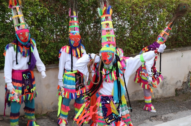 a group of gombeys, traditional Bermudian dancers